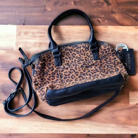 American Leather Co. Handbags - Leopard Print Purse by American Leather Co Austin